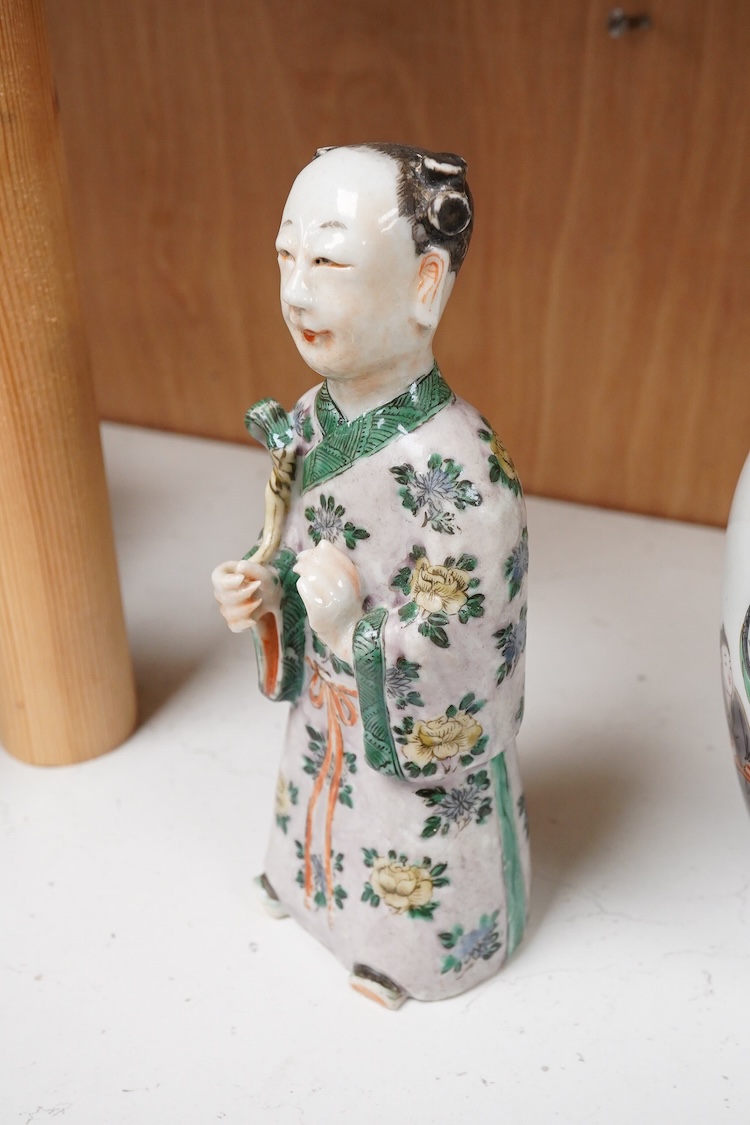 A Chinese 18th century figurine and a 20th century famille verte vase, largest 18cm high